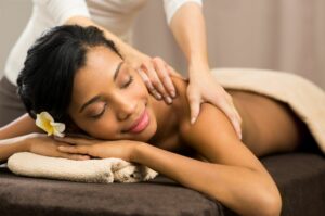 Young woman enjoying a massage.